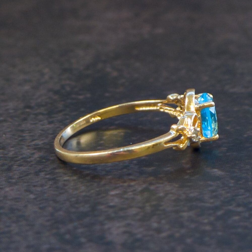 14k Gold Oval Blue Topaz Ring with Diamond Accents - Picture 13 of 15